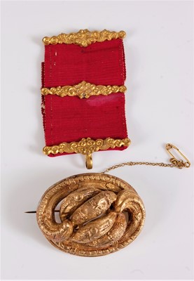 Lot 2585 - A 19th century brooch, the unmarked yellow...