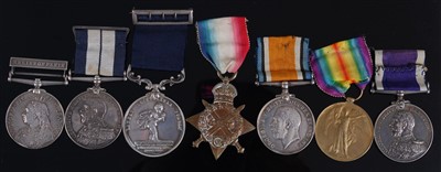 Lot 304 - A Victoria/George V Naval medal group of seven to include