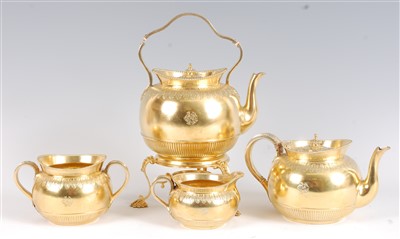 Lot 1214 - A mid-Victorian silver gilt four-piece tea set,...