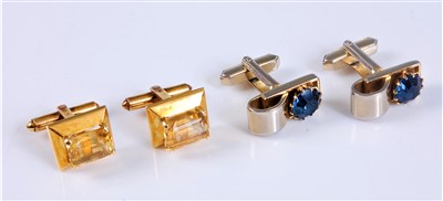 Lot 2618 - A pair of 14ct citrine cufflinks, the step cut...
