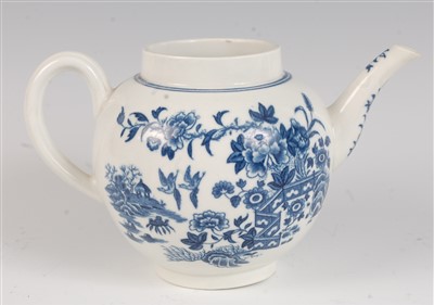 Lot 1064 - A Worcester porcelain bullet shaped teapot,...