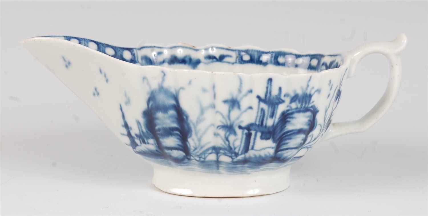 Lot 1080 - A rare Worcester porcelain sauceboat,...