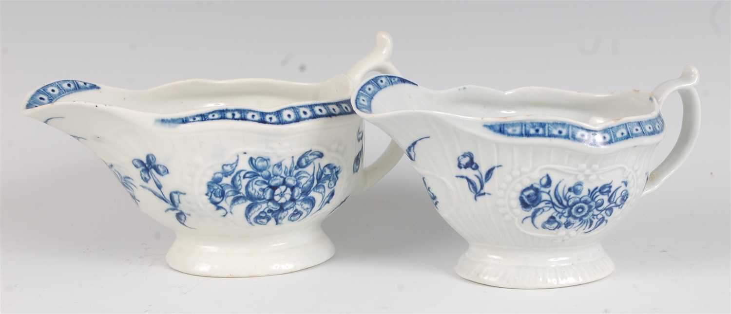 Lot 1081 - A Worcester porcelain strap fluted sauceboat,...