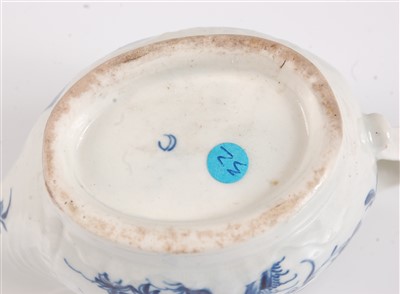 Lot 1087 - A Worcester porcelain press-moulded sauceboat,...