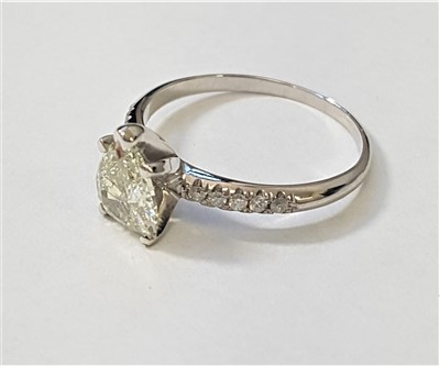 Lot 1312 - A 14ct pear shaped diamond ring, the pear...