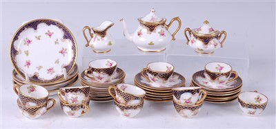 Lot 1102 - A Crown Staffordshire porcelain dolls part tea...