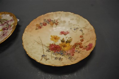 Lot 1099 - A Royal Worcester reticulated cabinet cup and...
