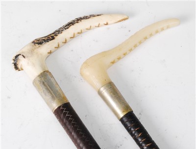 Lot 340 - Two early 20th century plaited leather clad riding crops