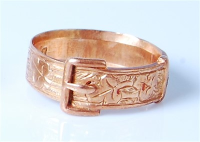 Lot 2567 - A Victorian 18ct gold belt ring, having leaf...