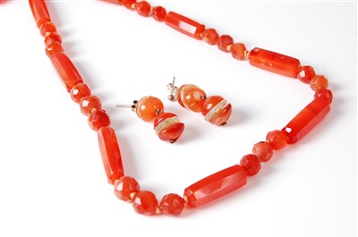 Lot 2676 - An Art Deco beaded carnelian necklace, 70cm;...