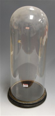 Lot 115 - A large Victorian glass dome, on circular...
