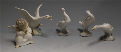 Lot 173 - A Lladro porcelain figure of a cherub in...