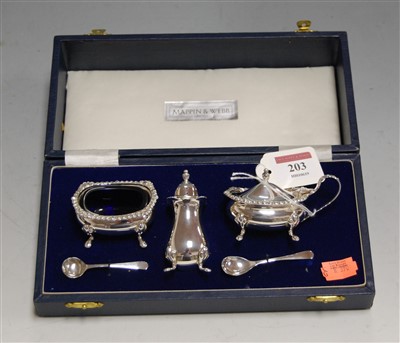Lot 203 - A modern silver three piece cruet set to...