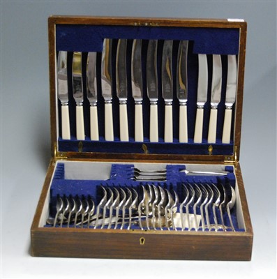 Lot 218 - A mid-20th century oak cased canteen of silver...