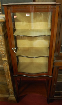 Lot 1245 - A circa 1900 mahogany serpentine front single...