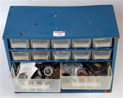 Lot 457 - A metal 13 drawer cabinet containing model...