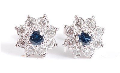 Lot 2502 - A pair of white metal and sapphire circular...