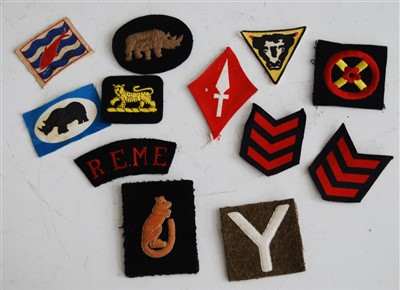 Lot 235 - A collection of cloth formation signs, to...