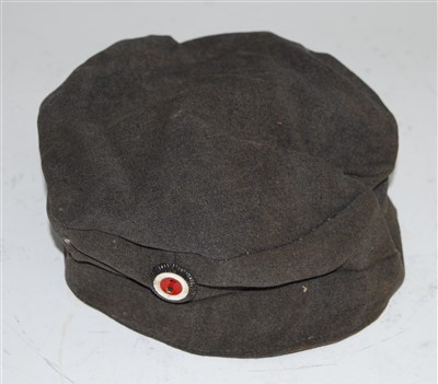 Lot 238 - A German feldmutze, in grey with blue...