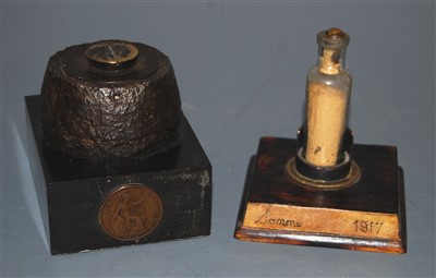 Lot 251 - A deactivated shell fuse, on square marble...