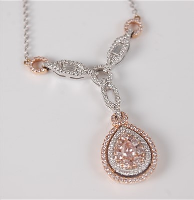 Lot 1172 - An 18ct white and rose gold fancy pear shaped...
