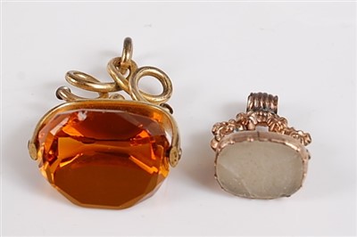 Lot 2514 - Two base metal fob seals, to include an orange...