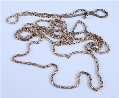 Lot 2517 - A yellow metal oval link guard chain, unmarked...