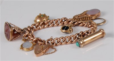 Lot 1178 - A 9ct gold curblink bracelet, containing a...