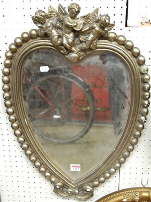 Lot 1115 - A modern silvered plaster heart shaped wall...