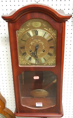 Lot 1116 - A reproduction mahogany cased droptrunk wall...