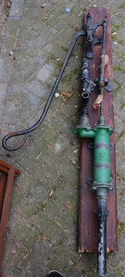 Lot 1122 - A mounted cast iron water pump