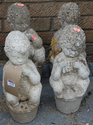 Lot 1124 - A set of four contemporary reconstituted stone...