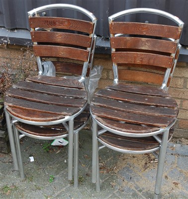 Lot 1125 - A set of four modern tubular metal framed and...