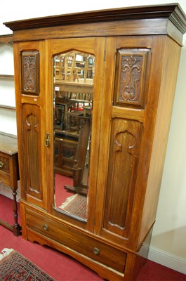 Lot 1148 - An Edwardian walnut single bevelled mirror...