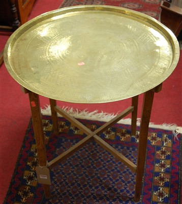 Lot 1151 - An early 20th century engraved circular brass...