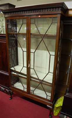 Lot 1156 - An early 20th century mahogany double door...