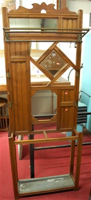 Lot 1167 - An Edwardian oak mirrorback hallstand, w.76cm