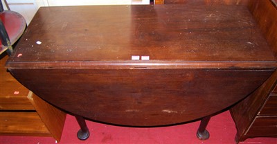 Lot 1175 - A George III mahogany dropleaf dining table,...
