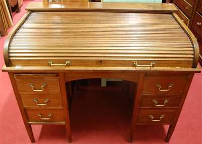 Lot 1188 - An early 20th century walnut cylinder topped...