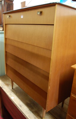 Lot 1191 - A 1970s teak Avalon Yatton chest of five long...