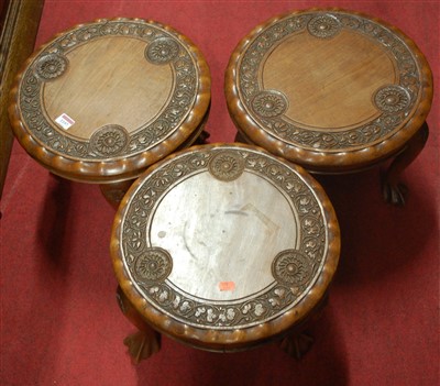 Lot 1197 - A set of three Indian floral relief carved...
