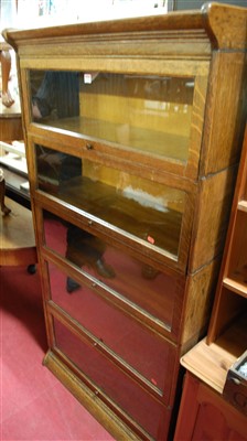 Lot 1199 - A 1930s Globe Wernicke oak five-tier stacking...