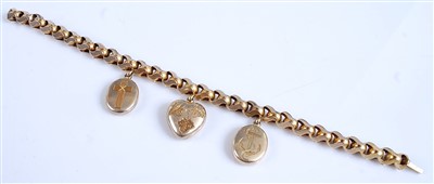 Lot 2573 - A yellow metal fancylink bracelet, having...