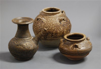 Lot 18 - An earthenware burial type vase of squat...