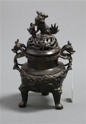 Lot 34 - A bronze koro and cover, the pierced cover...