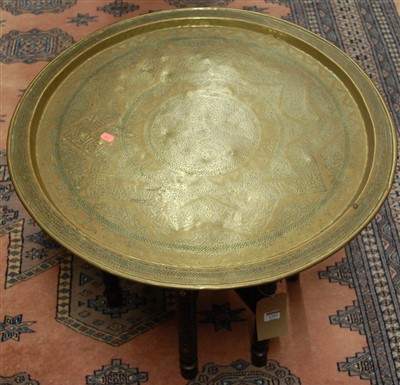 Lot 1202 - An engraved brass topped circular benares...
