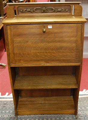 Lot 1205 - An early 20th century oak ledgeback students...