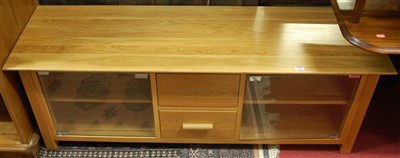 Lot 1206 - A contemporary light oak media unit, w.140cm