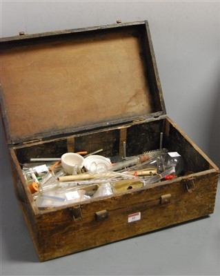Lot 40 - An early 20th century pine box containing...
