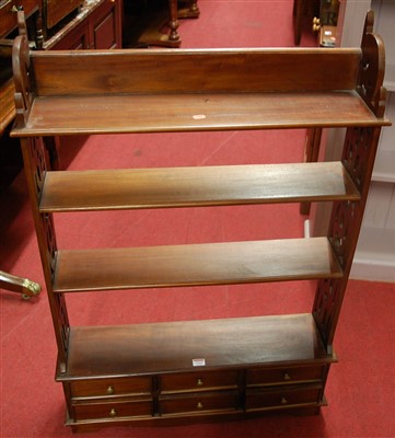 Lot 1215 - A contemporary hardwood four-tier hanging wall...